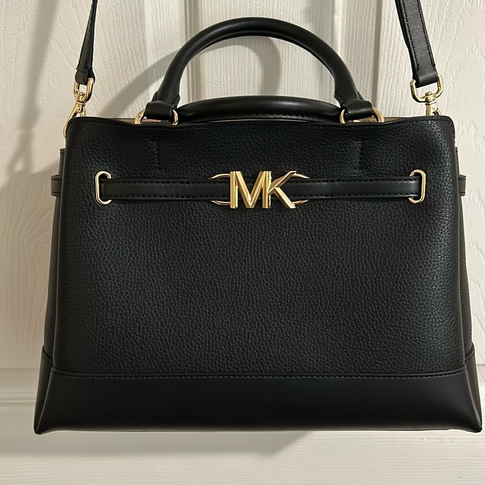 Michael Kors shoulder and top handle purse.